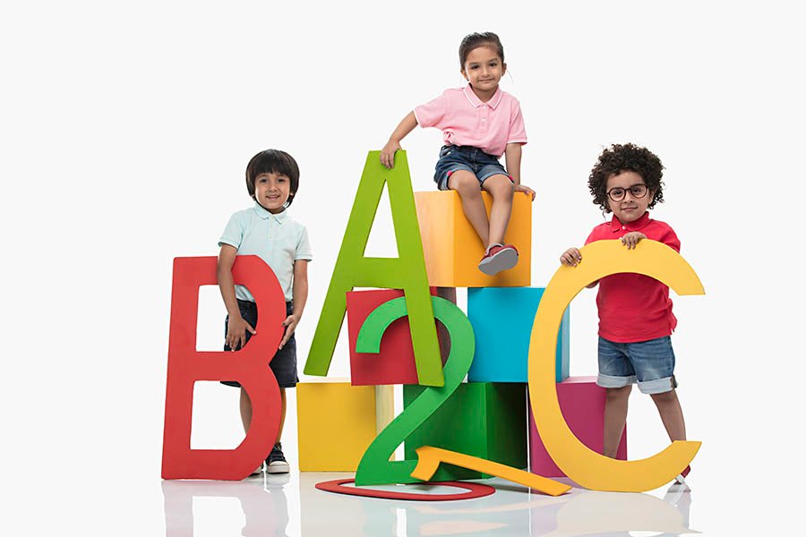 Children with ABC blocks